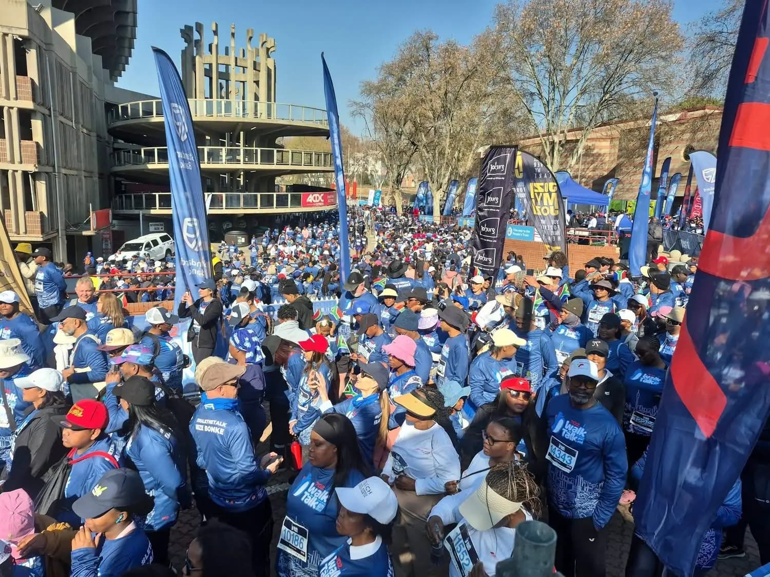 Walkers pack the street at 702 Walk the Talk