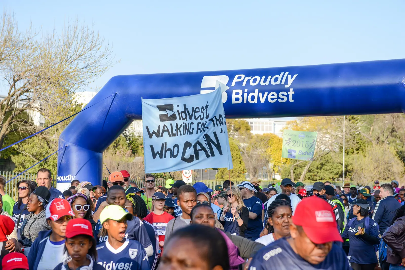 Walkers set off under the Proudly Bidvest start arch