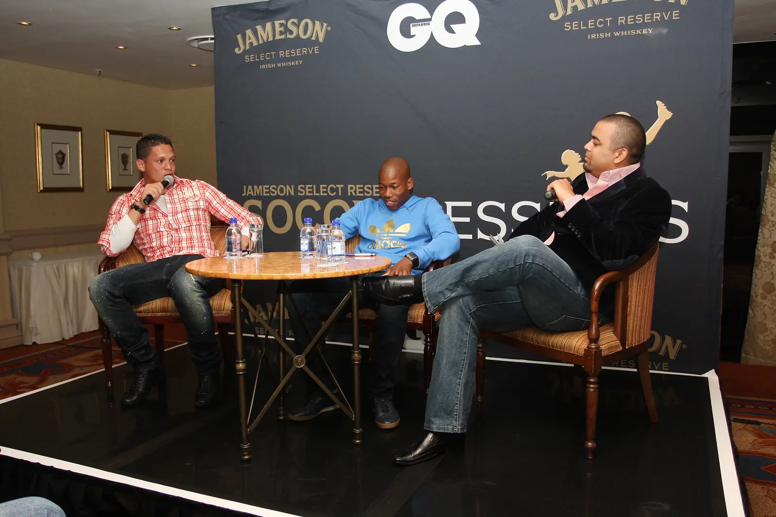Panel on stage in front of the Jameson and GQ Soccer Sessions backdrop