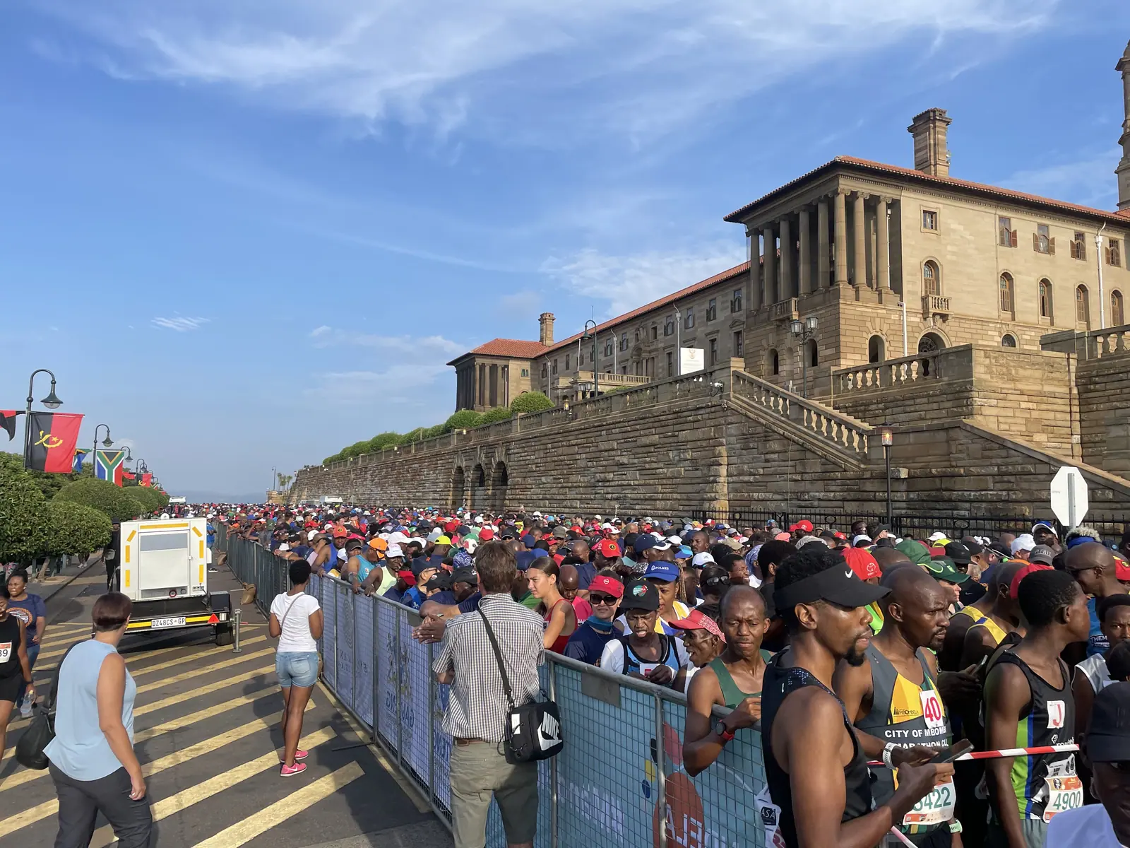 Participants gather below the Union Buildings before the start