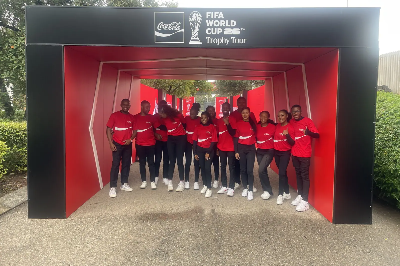 Event crew in the Coca-Cola FIFA World Cup 26 Trophy Tour entrance tunnel